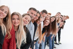 Group of young people in line.