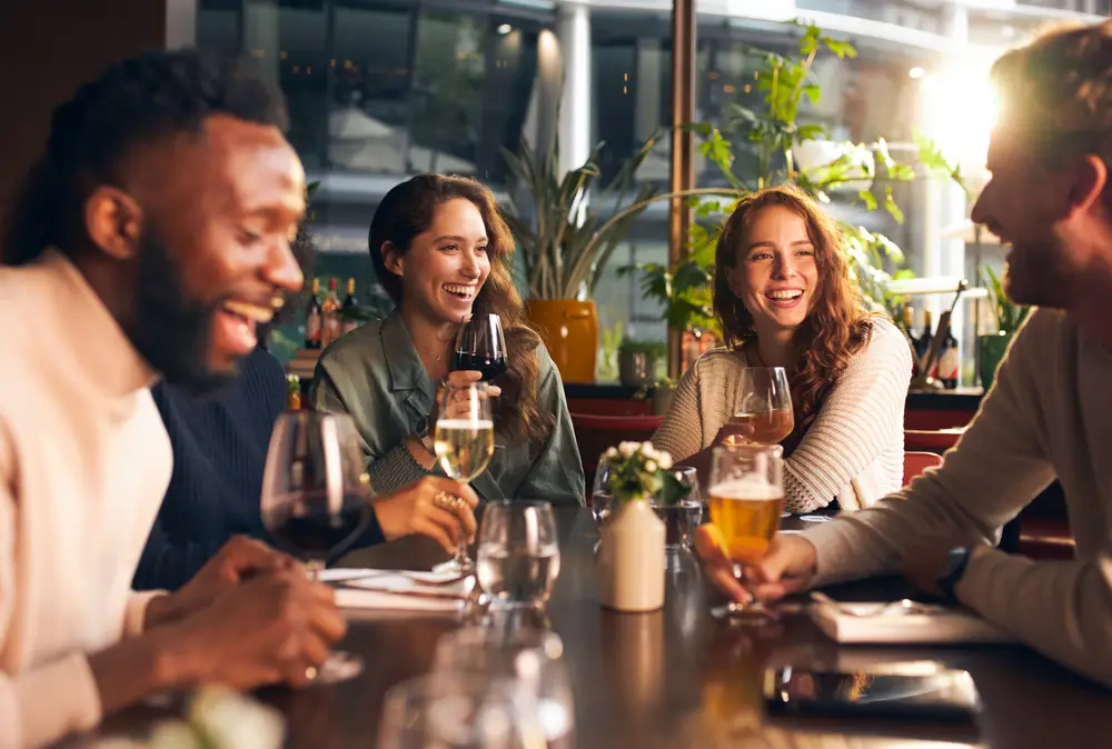 Friends enjoying drinks in a bar.